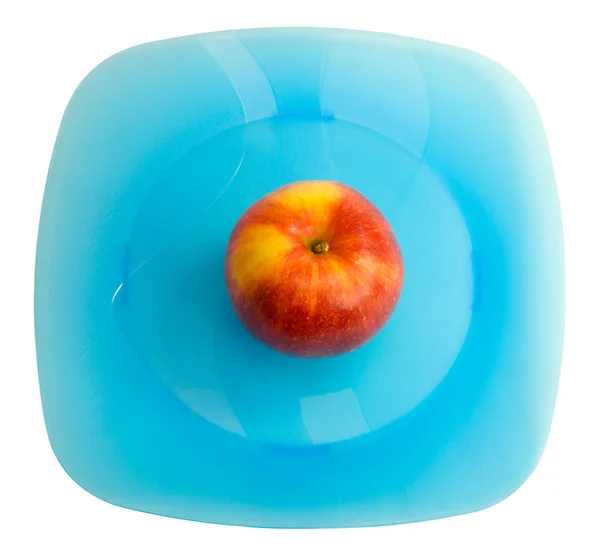 ブルー プレートに赤いリンゴ — ストック写真