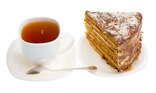 茶杯子和一块蜂蜜蛋糕 — 图库照片