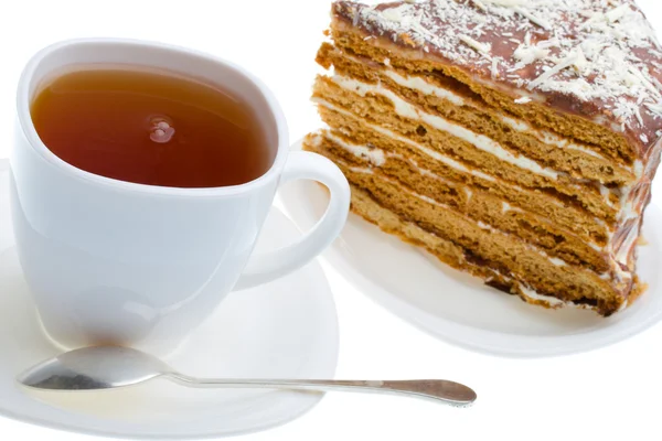 Taza de té y pedazo de pastel de miel — Foto de Stock