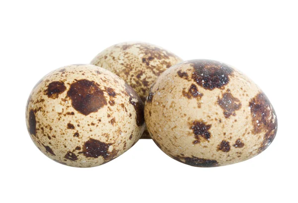 Три перепелиных яйца — стоковое фото