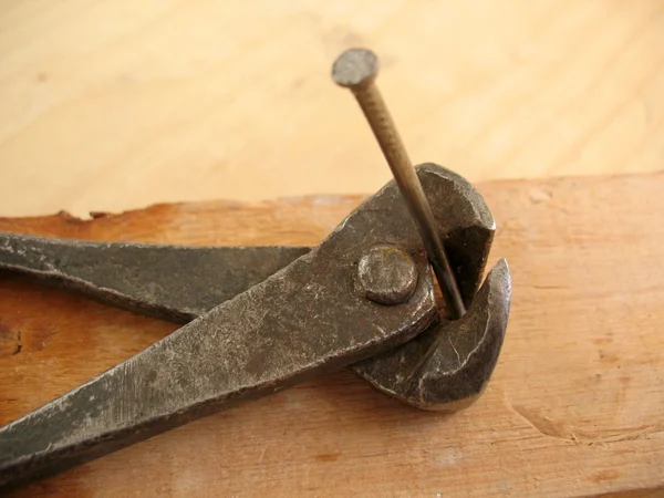 stock image Nail and pliers