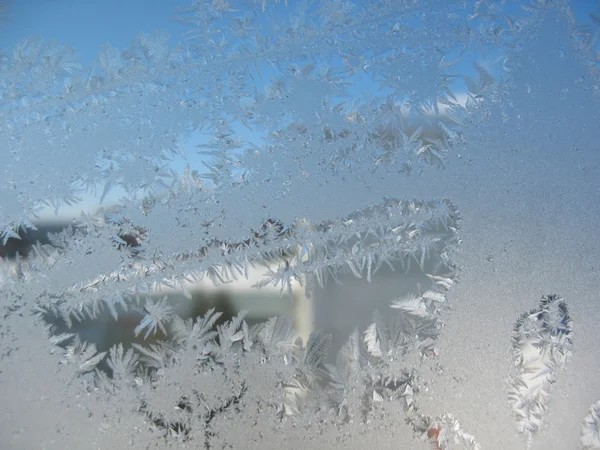 Patrón de nieve en ventana de invierno —  Fotos de Stock
