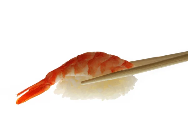 Sushi med pinnar skott på vit — Stockfoto