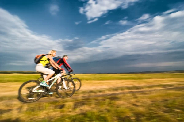 Cyclists in motion — Stock Photo, Image