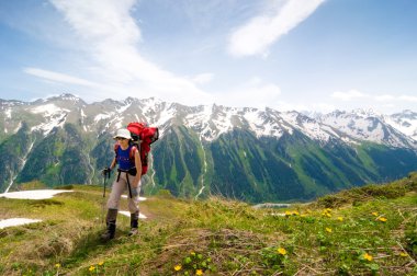 Trekking in mountains clipart