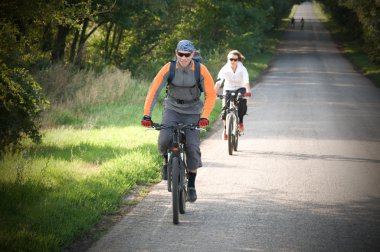 Couple biking clipart