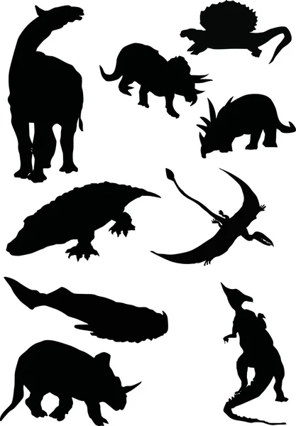 Silhouettes of dinosaurs — Stock Vector