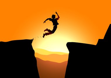 Extreme jump against a rising sun clipart