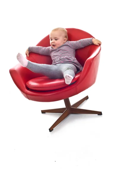 Babygirl em uma cadeira — Fotografia de Stock