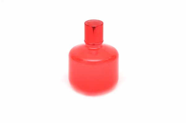 Bottiglia di profumo rosso — Foto Stock