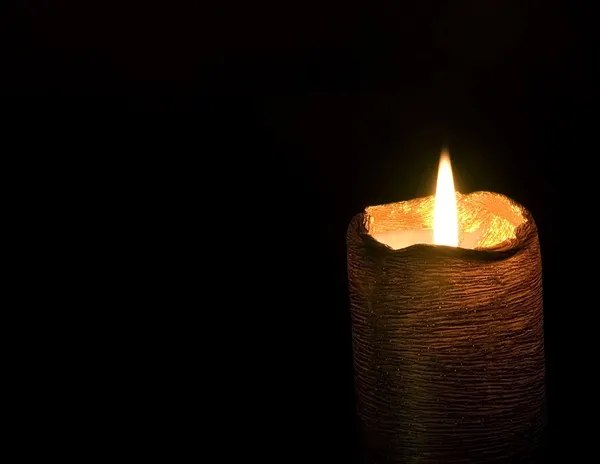 Золотая свеча — стоковое фото