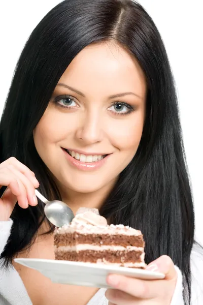 チョコレート ケーキを持つ女性の笑みを浮かべてください。 — ストック写真