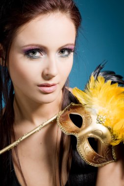 Woman with carnival mask