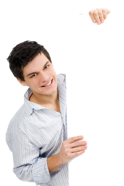 Улыбающийся человек держит пустой рекламный щит — стоковое фото
