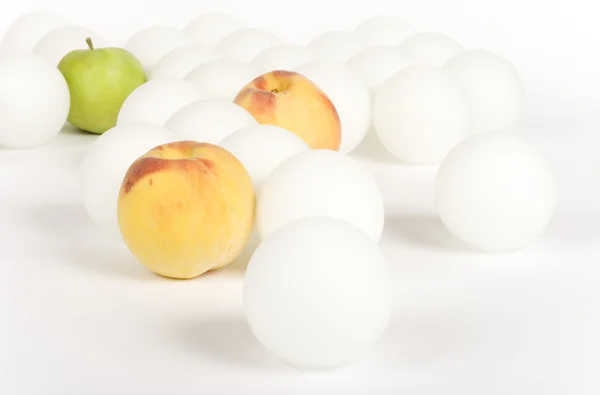 White spheres and fruit — Stock Photo, Image