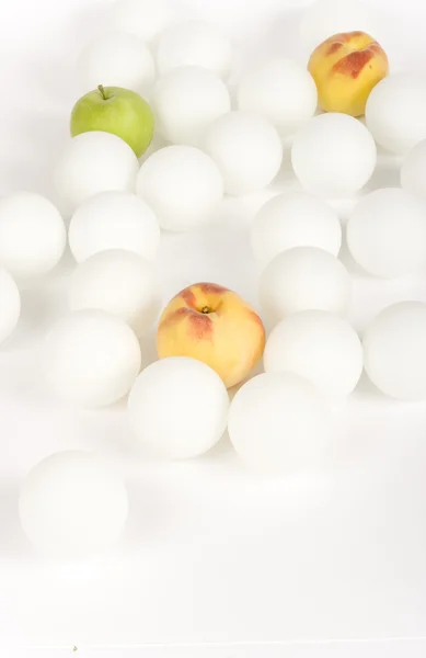 White spheres and fruit — Stock Photo, Image