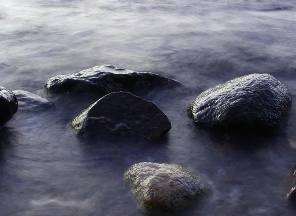 stock image Rocks in water