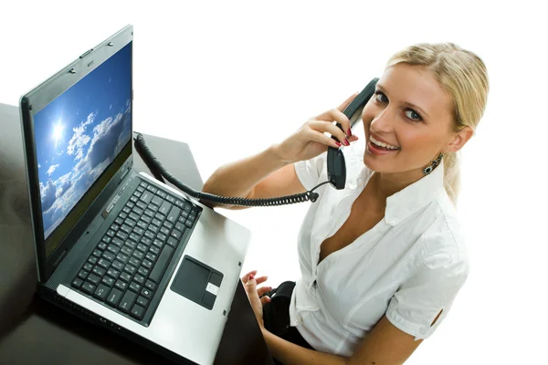 The secretary with the laptop, speaks by phone, — Stock Photo, Image