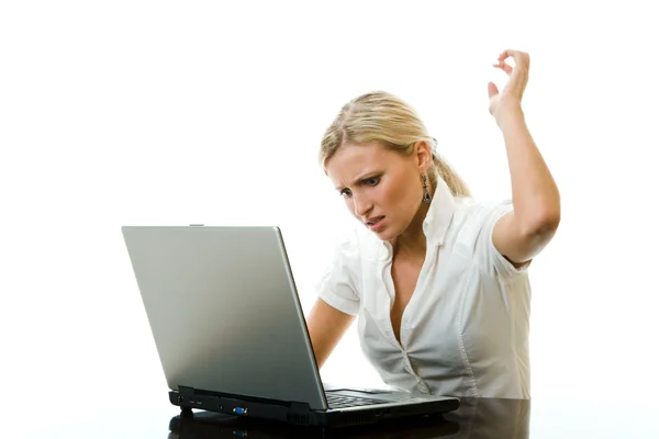 The girl is angry with the computer, isolated on — Stock Photo, Image