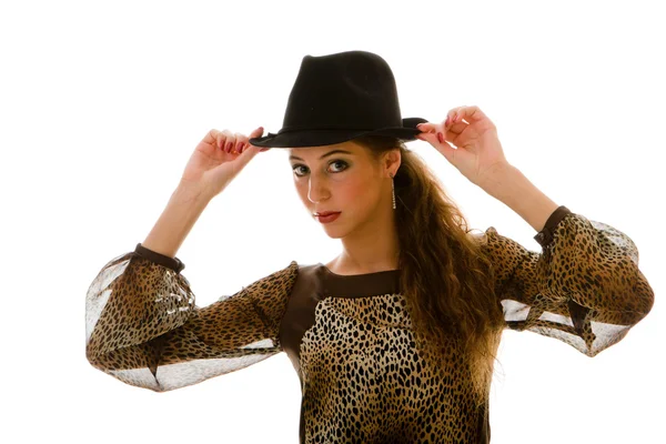Posando modelo em um vestido sexual e em um chapéu — Fotografia de Stock