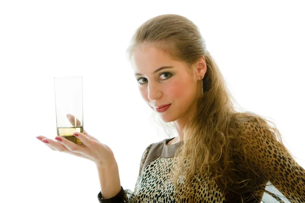Den unga vackra kvinnan med ett saft glas Stockbild