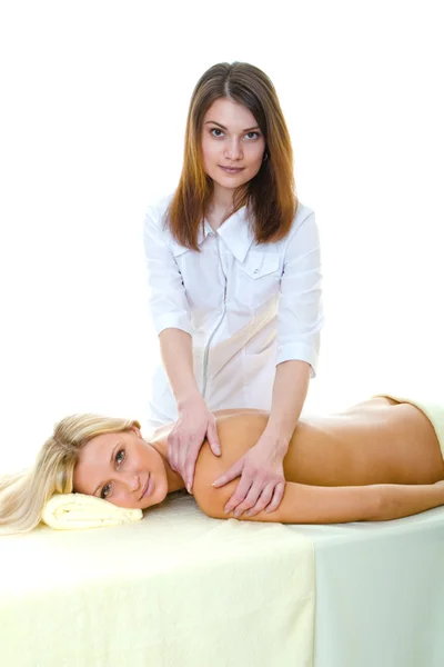 Il massaggiatore fa massaggi alla bella donna Foto Stock