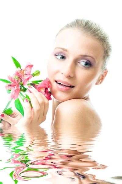 Beautiful nacked girl with flowers — Stock Photo, Image