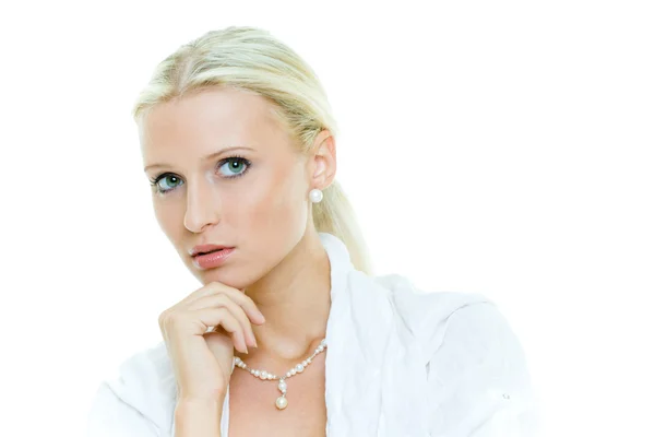 Portrait of the young pensive blonde woman in wh — Stock Photo, Image
