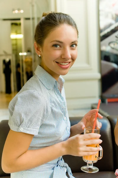 Portrait of a young woman with a glass — Stock Photo, Image