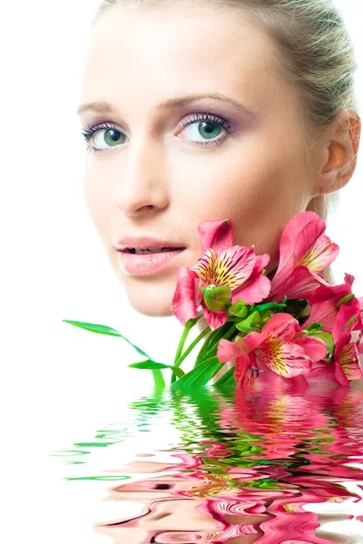 Красива оголена дівчина з квітами Стокова Картинка