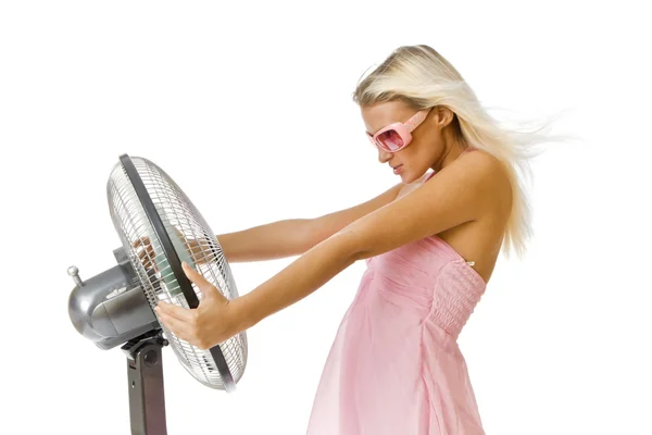 Mujer linda sostiene un ventilador . Imagen de stock