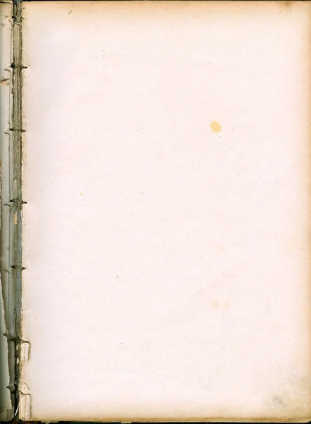 Gulnade papper blad från gamla boken — Stockfoto