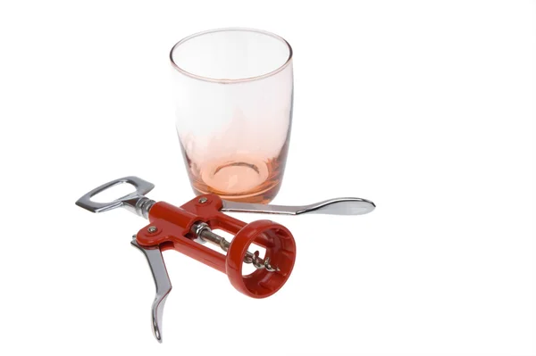 Red corkscrew and glass — Stock Photo, Image