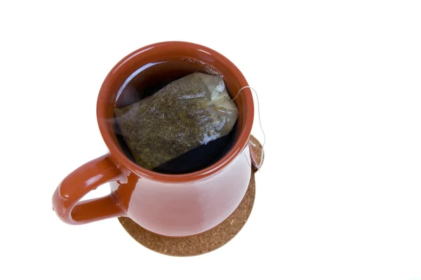Heřmánkový čaj - šálek čaje s sáček čaje — Stock fotografie