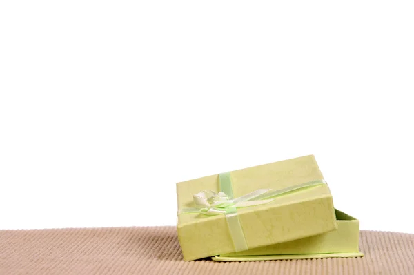 Green mini gift box with ribbon — Stock Photo, Image
