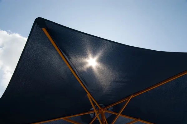 Parasol and blue sky — Stock Photo, Image