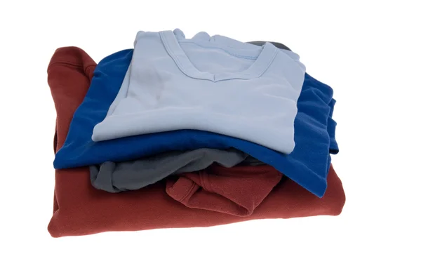Stack shirts isolated on white — Stock Photo, Image