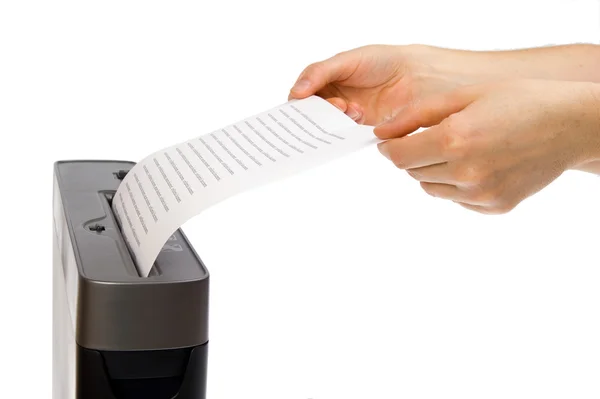 Hand and paper shredder — Stock Photo, Image