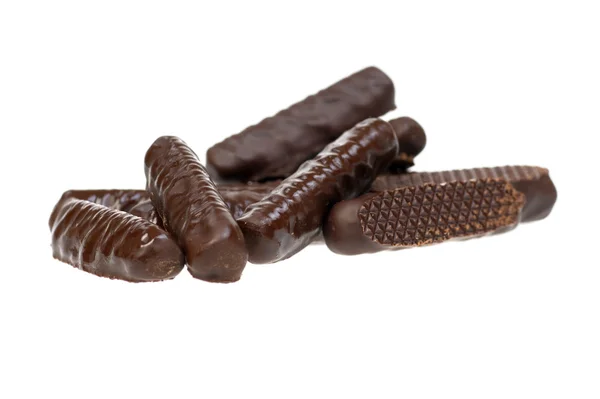 Schokoladenstangen auf weißem Papier isoliert — Stockfoto