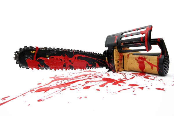 Krwawe chainsaw — Zdjęcie stockowe