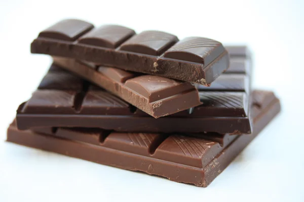 Trozos de una barra de chocolate —  Fotos de Stock