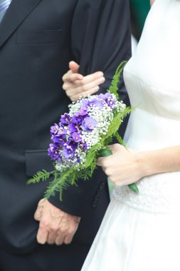 Bride holding wedding bouquet clipart