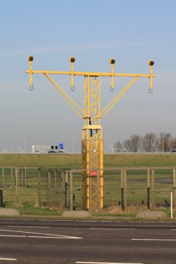 Traffic lights near an airport runway clipart