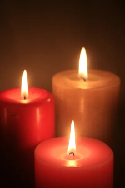 Grupo de tres velas encendidas — Foto de Stock