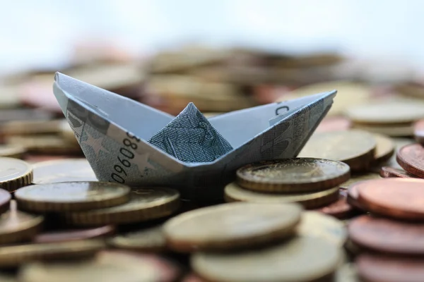 Sailing on euro coins — Stock Photo, Image