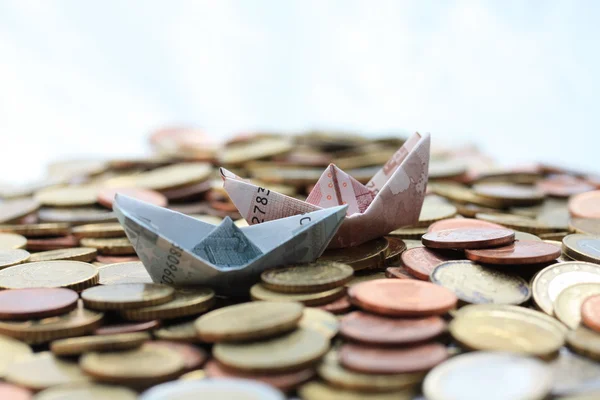 Boat on a money sea — Stock Photo, Image