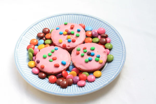 Roze geglaceerde cupcakes - childrens birthda — Stockfoto