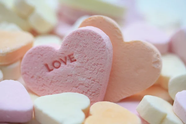 Liefde op een roze hart — Stockfoto