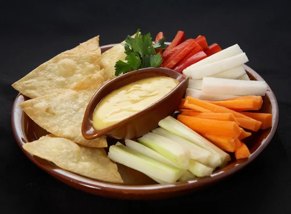 stock image Fresh vegetables with sauce