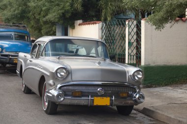 Old car on street Varadero Cuba clipart